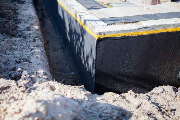 Professional Wet Basement Repair technician working in Bourbon, IN